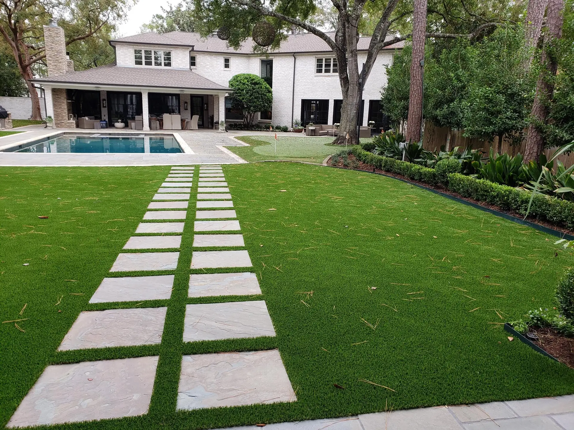 backyard landscaping with artificial grass