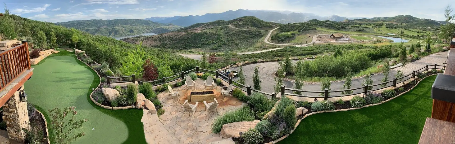 Signature mountain-estate putting green with artificial turf and panoramic views designed by Celebrity Greens®
